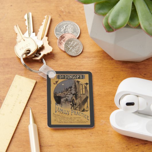 ヴィンテージブックカバードクターダンロップの家族の練習 キーホルダー (デスク)