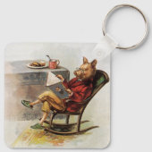 ヴィンテージユーモア、ロッキングチェア読の豚の本 キーホルダー (裏面)