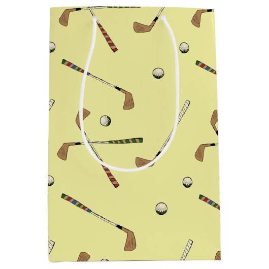 ヴィンテージレトロゴルフゴルファーのクラブボールパターンイエロー ミディアムペーパーバッグ (正面)