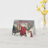 ヴィンテージレトロサンタクロースとクリスマスエンジェル カード (黄色い花)