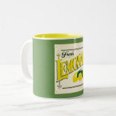 ヴィンテージレモネード標識レモン果実黄緑色 ツートーンマグカップ (正面左)