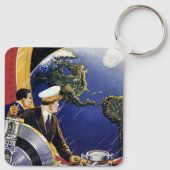 ヴィンテージ宇宙飛行士が地球を周回 キーホルダー (裏面)