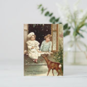 ヴィンテージ小さな女の子食べ物を与えの鹿のクリスマス シーズンポストカード (スタンド正面)