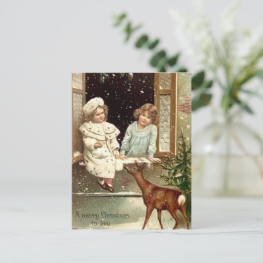 ヴィンテージ小さな女の子食べ物を与えの鹿のクリスマス シーズンポストカード (スタンド正面)
