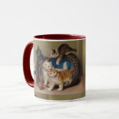ヴィンテージ猫が赤いボールをソフィー・シュペリッヒを生み出す マグカップ (正面左)