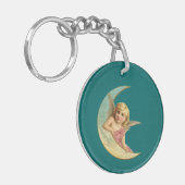 ヴィンテージ画像 – 天使が三日月に座る キーホルダー (正面左)