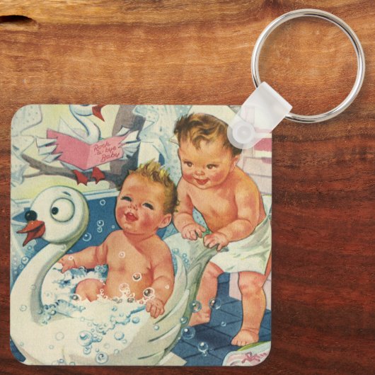 ヴィンテージ遊の白鳥の浴槽に入る子どもたちの泡 キーホルダー (裏面)