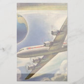 ヴィンテージ飛んでいるで世界中に雲が広がる飛行機 (正面)