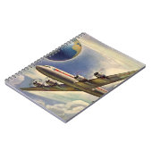 ヴィンテージ飛んでいるで世界中に雲が広がる飛行機 ノートブック (左側)