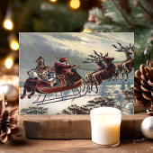 ヴィンテージ飛んでいるサンタそりトナカイ シーズンポストカード