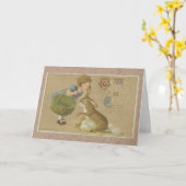 ヴィンテージ1911ハッピーイースターバニーアンドガール カード (黄色い花)