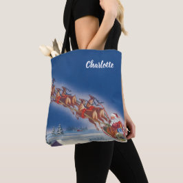 ヴィンテージ クリスマス、トナカイとともにそりを飛ばすサンタクロース トートバッグ