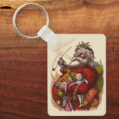 ヴィンテージ クリスマス、ヴィクトリア朝のサンタクロース パイプ おもちゃ キーホルダー (正面)