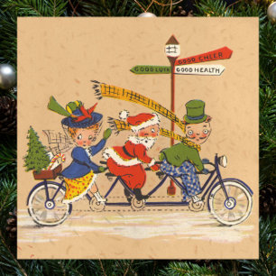 ヴィンテージ クリスマス、自転車に乗ったヴィクトリア朝のサンタクロース ポスター