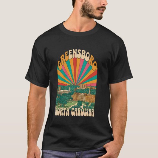 ヴィンテージ グリーンズボロ ノースカロライナ 夕焼け 空 街C Tシャツ (正面)
