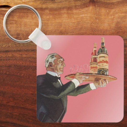 ヴィンテージ・バトラーがタキシードで盆にワインを運ぶ キーホルダー (正面)