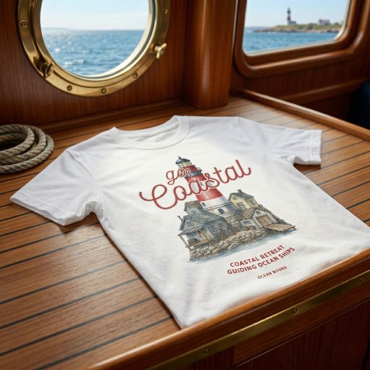 ヴィンテージ ライトハウスと海岸の村 グラフィック Tシャツ