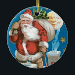 ヴィンテージSanta with Moon – ラウンド セラミックオーナメント<br><div class="desc">ビンテージのクリスマスカードから背後に月が輝く煙突のサンタ。</div>