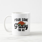 七面鳥の感謝祭ディナーに肉汁を注ぐ コーヒーマグカップ (左)