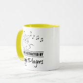 万丈選手に気さくされる不思議な猫 マグカップ (正面左)