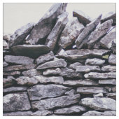 丈夫な積み重ねられた石の塀 ファブリック (クローズアップ)