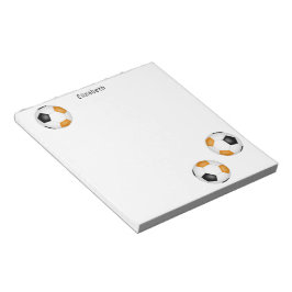 三つの黒オレンジ色のサッカーボールパーソナライズされた ノートパッド