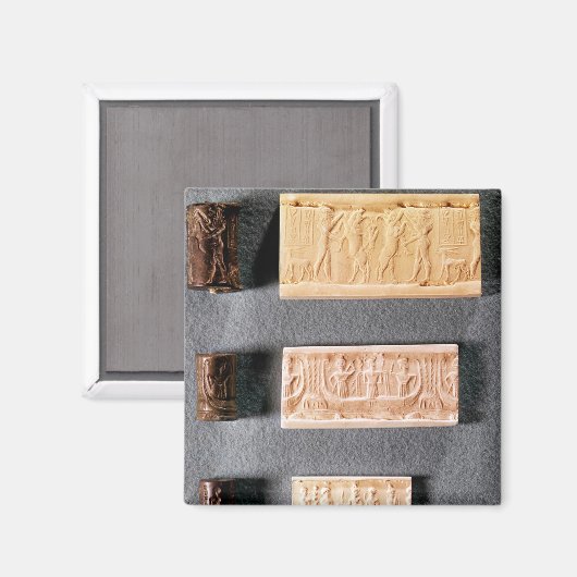 三本の円筒が印影で封じられている マグネット (正面/裏面)