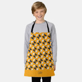三角形の黄色い青パターミニマルン エプロン (着用した状態)