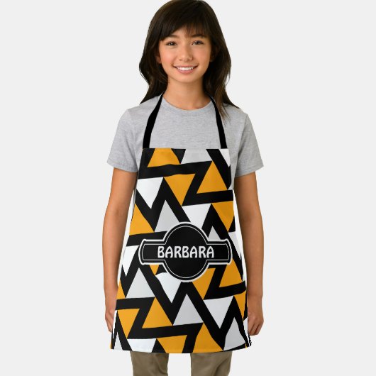 三角形の黄色の黒のパタミニマルーン エプロン (インサイチュ)