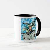 上で新聞および飛行機を持つビジネスマン マグカップ (正面右)