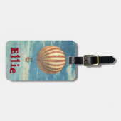 上へ遠くに& ラゲッジタグ (正面横)