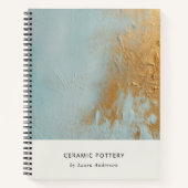 上品なアクアブルーピンク金ゴールド油テクスチャ ノートブック (正面)