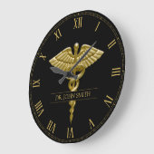 上品な医療金ゴールドカドゥセウスオンブラック ラージ壁時計 (傾斜)
