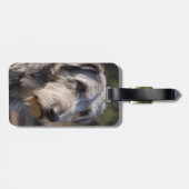 「不動の女王陛下、残忍な狼の目つき」 ラゲッジタグ (裏面横)