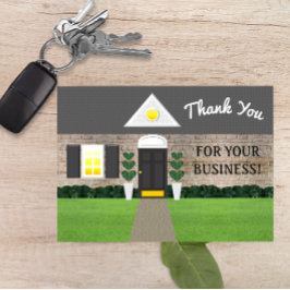 不動産仲介業者によって水漆喰を塗られる煉瓦家のサンキューカード サンキューカード