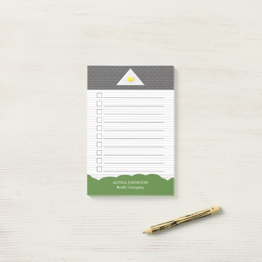 不動産仲介業者のかわいいホワイトハウスがIt後のメモをリストに載せる ポストイット (デスク上)