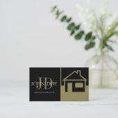 不動産仲介業者の金ゴールドの家かペーパー黒 名刺 (スタンド正面)