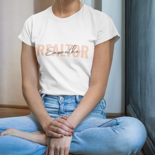 不動産仲介業者実在エステート剤赤面ピンクモノグラム Tシャツ