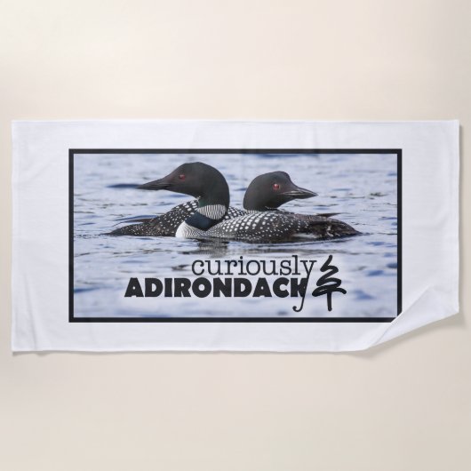 不思議そうにAdirondackのビーチタオル(水潜り鳥) ビーチタオル (正面)