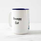 不機嫌な猫のマグカップ ツートーンマグカップ (正面左)