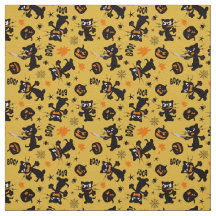 不機嫌な黒いハロウィーン猫と不気味かぼちゃ