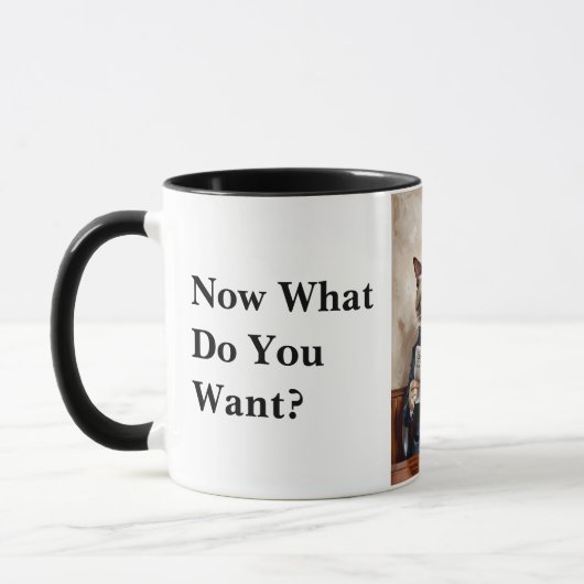 不機嫌読なオフィスキャット マグカップ (左)