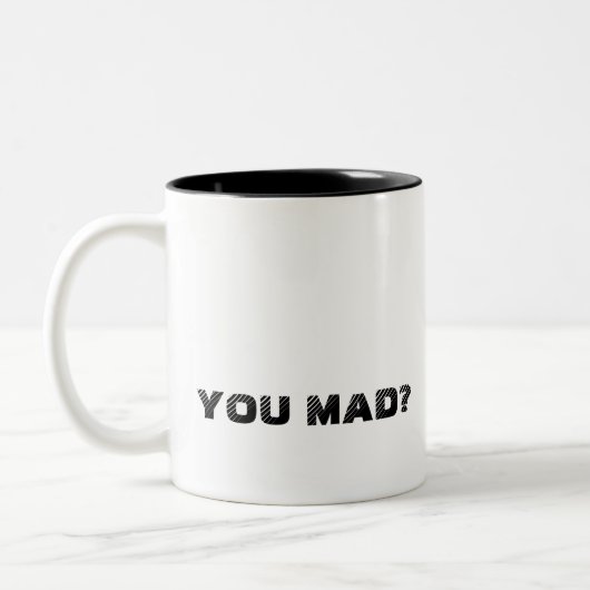 不機嫌? ツートーンマグカップ (左)