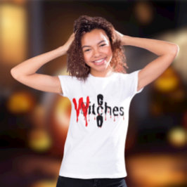 不気味おもしろい: 「魔女を動かす」ハロウィン🧙 ♀️🎃 Tシャツ