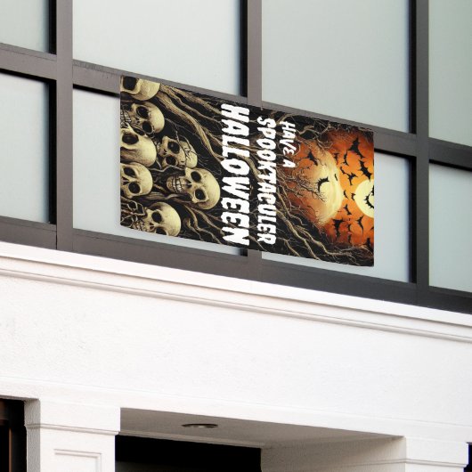 不気味なハロウィーンのスカルとこうもりを持つ 横断幕 (ビルの外側)