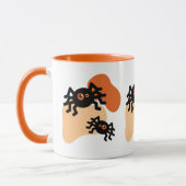 不気味な黒いクモとオレンジ色のブロブシェイプハロウィーン マグカップ (左)