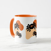 不気味な黒いクモとオレンジ色のブロブシェイプハロウィーン マグカップ (正面左)