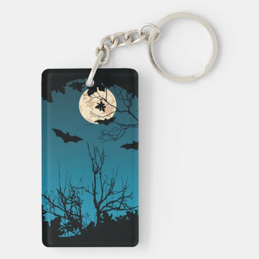 不気味ハロウィーンの夜の満月と飛んでいるこうもり キーホルダー (裏面)