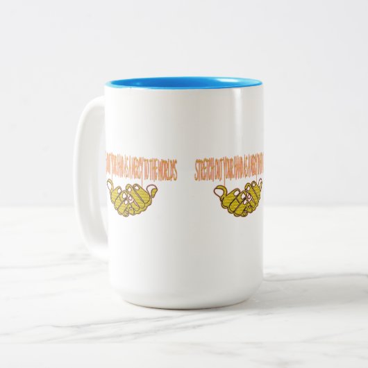 世の中に慈悲の手を差し出せ ツートーンマグカップ (正面左)