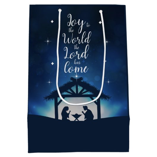 世界の星空への喜び出生シーンのクリスマス ミディアムペーパーバッグ (裏面)